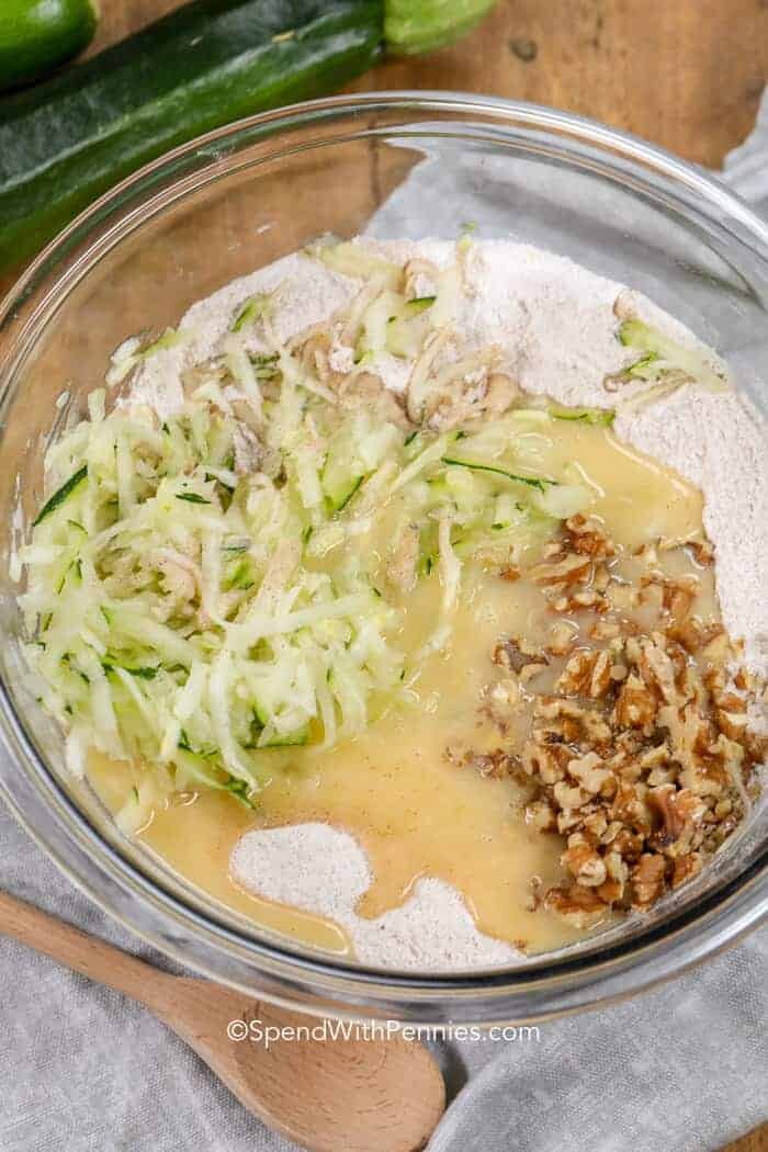 Zucchini Bread ingredients in a clear glass bowl