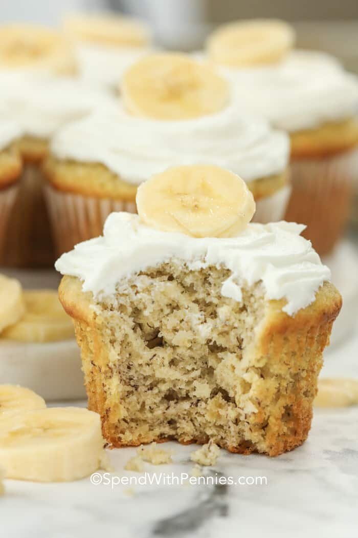 side view of banana cupcakes with a bite out of it