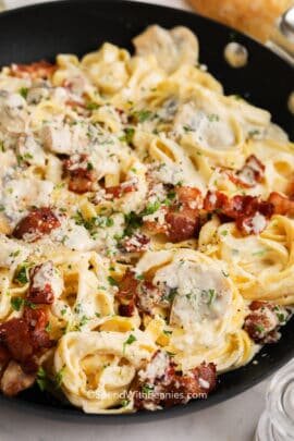 Creamy Mushroom Pasta with Bacon with cheese in the pan cooked