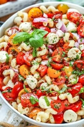 close up of Caprese Pasta Salad in a bowl