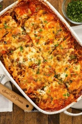 baked spaghetti sliced in a casserole dish