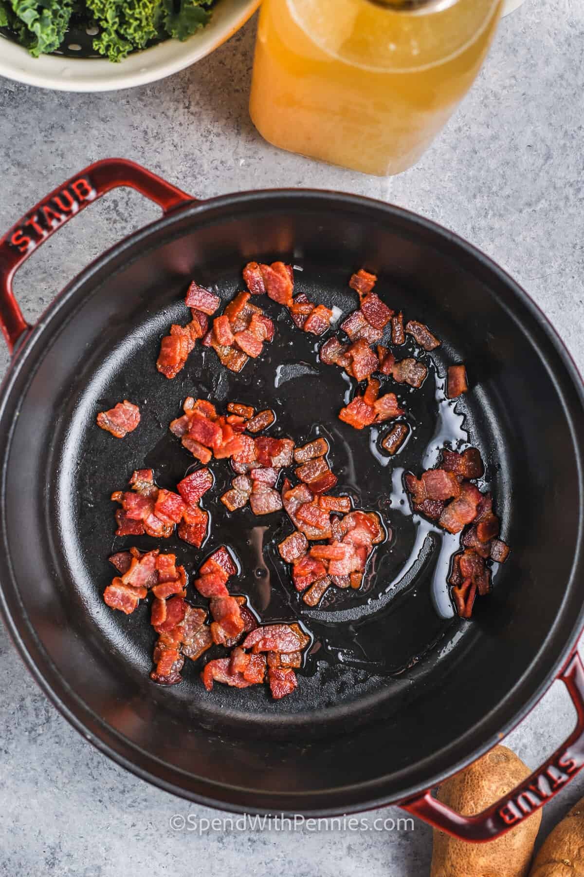 cooking bacon to make Zuppa Toscana