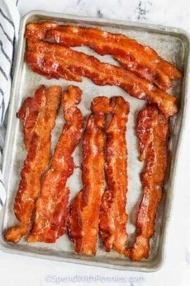 A pan of crispy bacon cooked in the oven