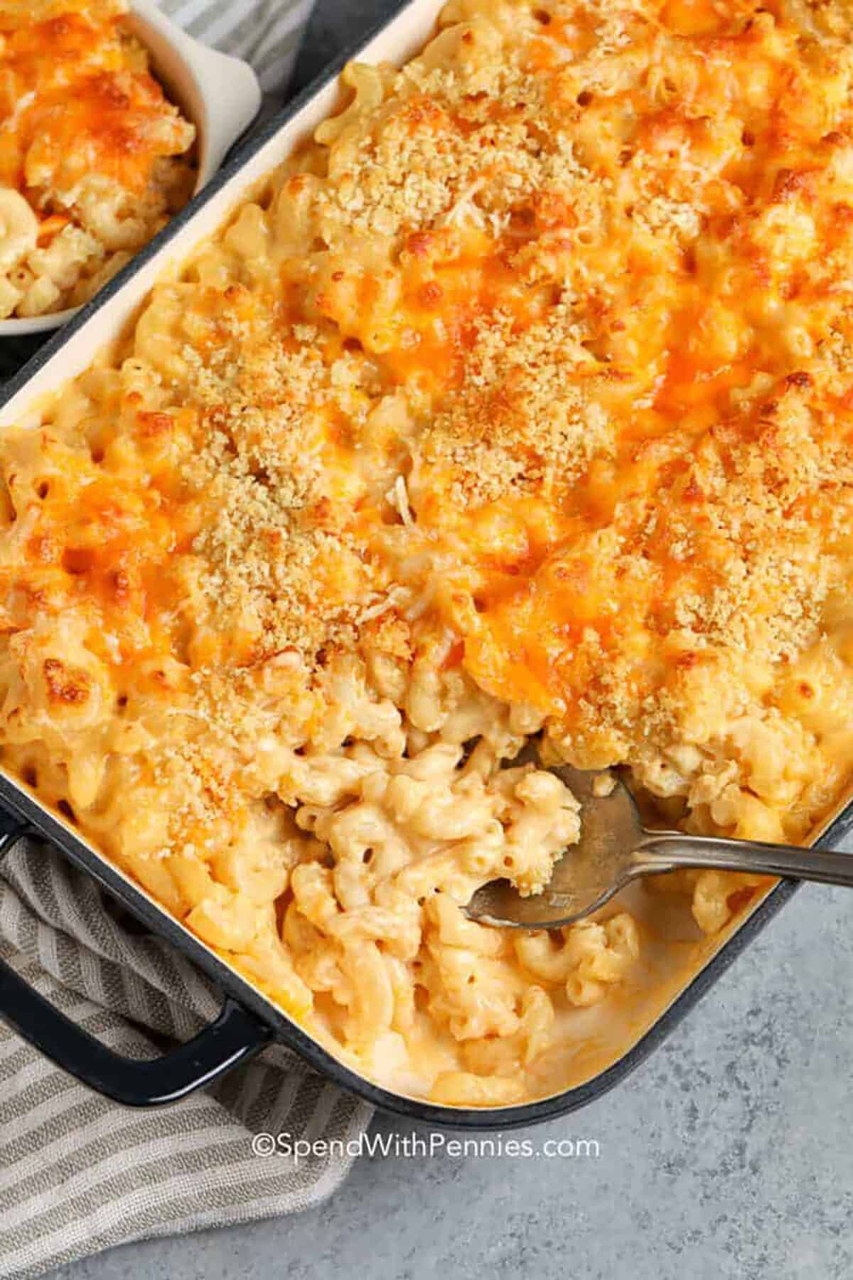 Baked Mac and Cheese in the dish with a spoon